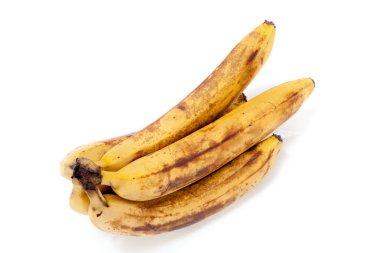 Olgun muz beyaz arka plan üzerinde yalan