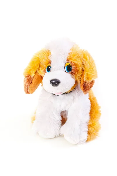 Niedliches Spielzeug Hund auf weißem Hintergrund — Stockfoto
