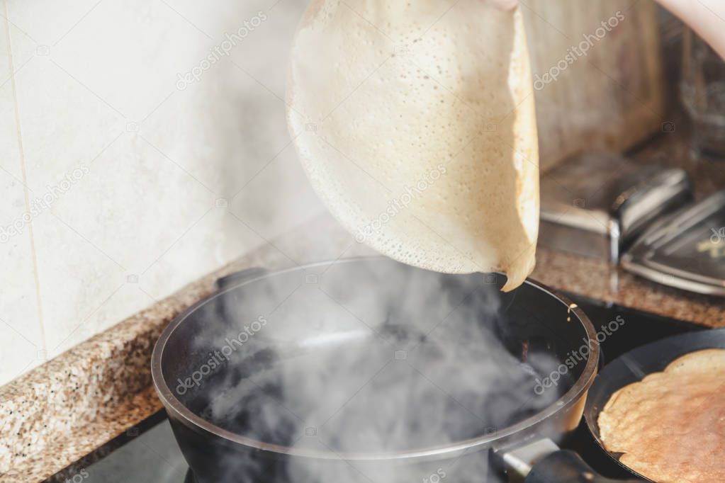 finished pancake is removed from frying pan