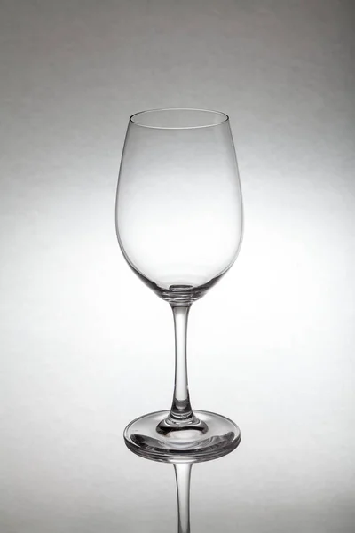 Glass wine glass stands on glass — Stock Photo, Image