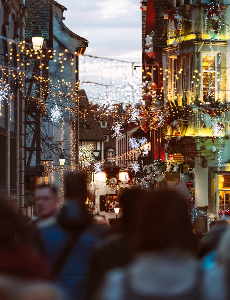 Christmas Market atmosphere in Strasbourg, France people illumin