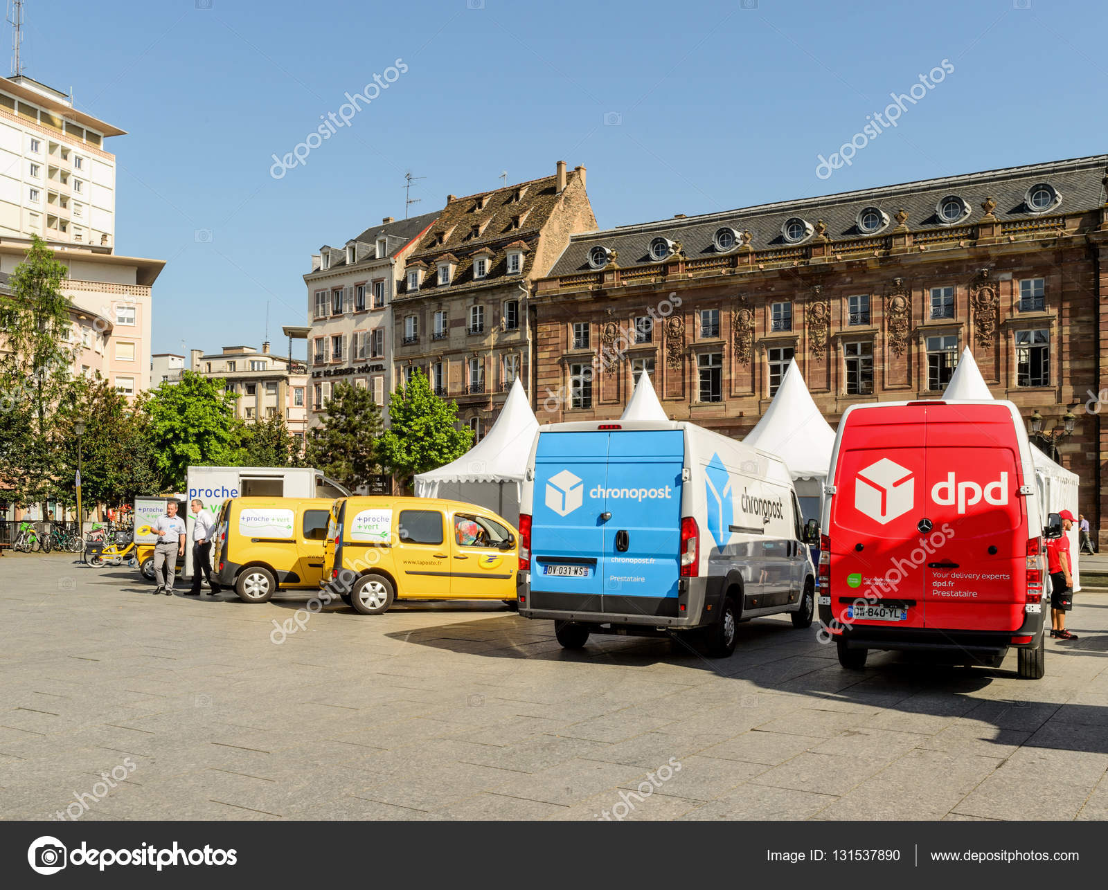 Chronopost DPD La poste vans in a row city Stock Editorial