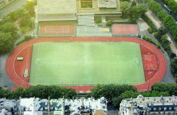 Empty stadium soccer field on sunny day — Stock Photo, Image