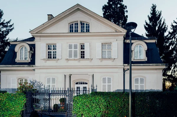 Beautiful house at dusk in classic French architecture — Stock Photo, Image