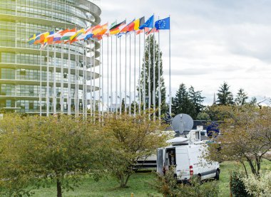 Media TV Truk reporting live from European Parliament  clipart