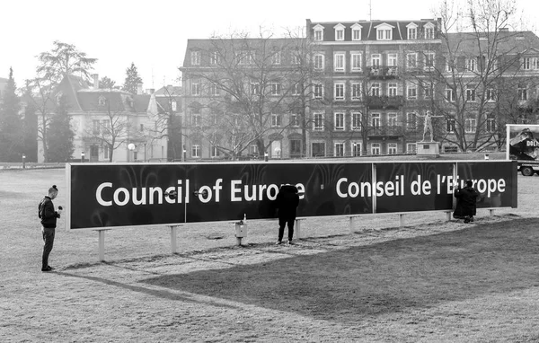 Cleaning team working to maintain the Council of Europe signage — Stock Photo, Image