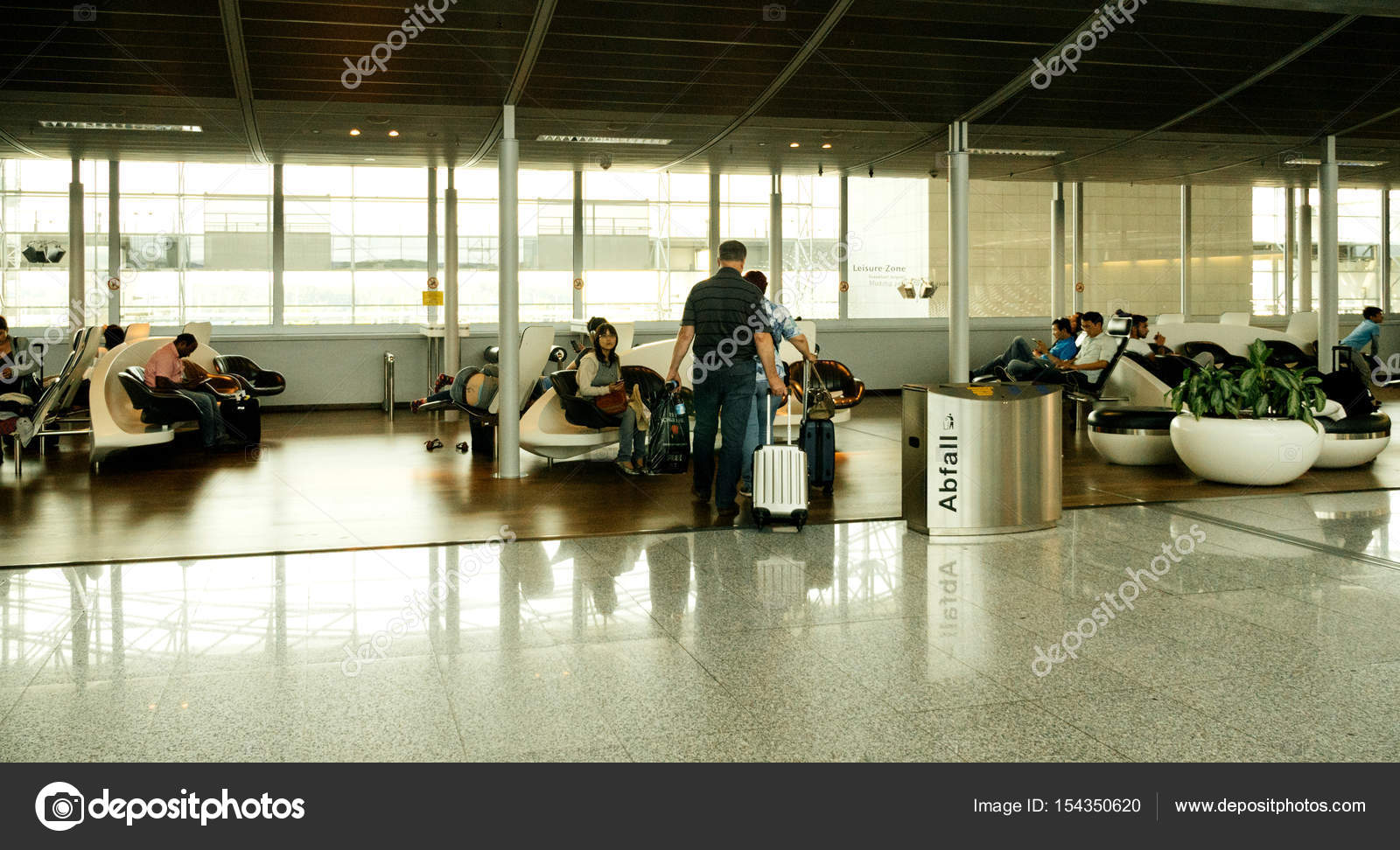Airport lounge with people walking Stock Editorial Photo © ifeelstock