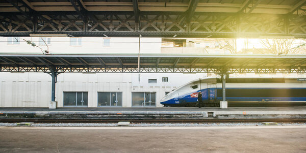 Paris train station with fast TGV train on platform 
