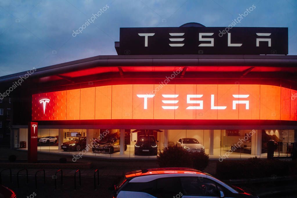 LONDON, UNITED KINGDOM MAR 8, 2017: Tesla Motors showroom with multiple luxury Tesla cars inside. Tesla is an American company that designs, manufactures, and sells electric cars