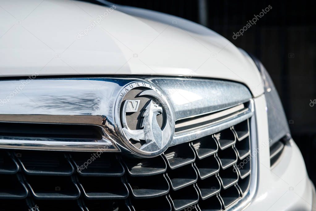 BRISTOL UNITED KINGDOM - MAR 7, 2017: Vauxhall logotype insignia on a white executive car. The Vauxhall logo is based on a mythical creature called the 