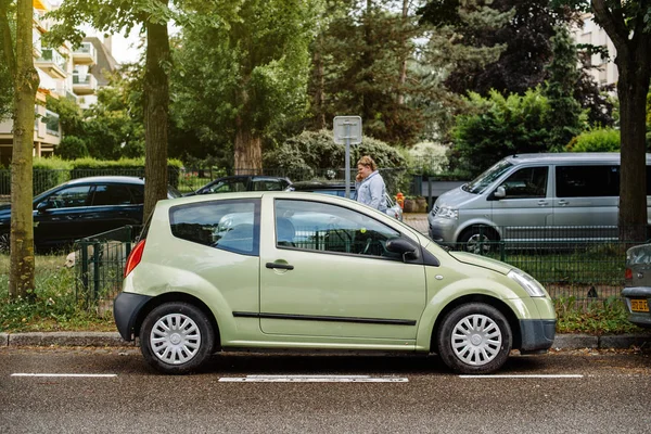 Green Citroen C2 car parked on French street — Stock Photo, Image