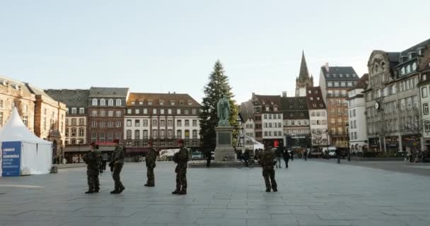 Police officers surveilling the center of Strasbourg — Stock Video