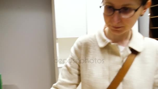 Female customer at IKEA furniture store — Stock Video