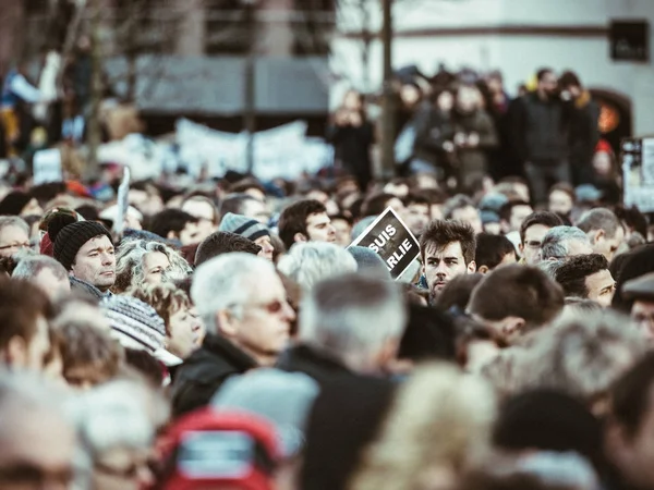 Large crowd of people protesting after Paris terrorist attack on — Stock Photo, Image