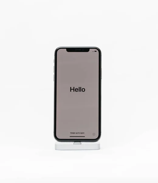 Apple iPhone X изолированный белый фон с приветственным словом в Fren — стоковое фото