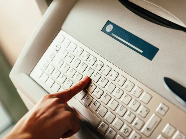 Using modern ATM keyboard — Stock Photo, Image