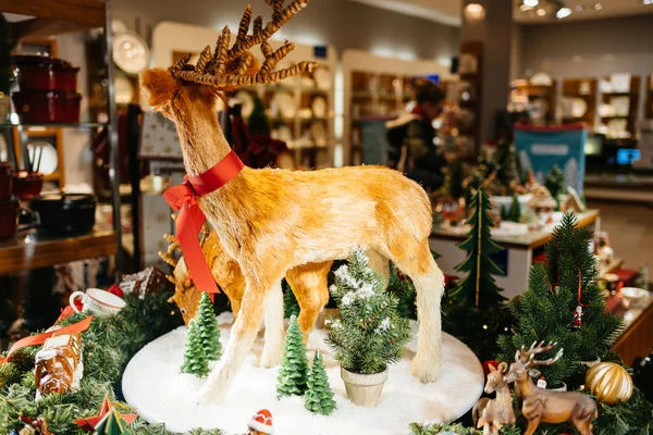 Reindeer toys and Christmas decoration on display in Villeroy & — 图库照片