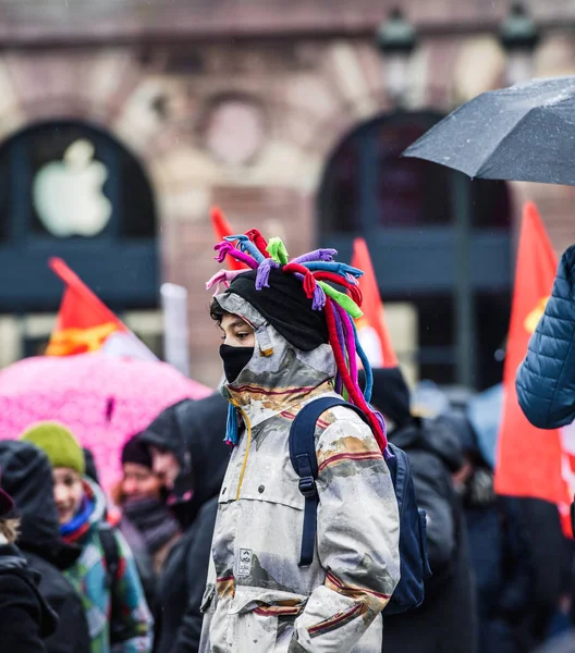 Young oby at protest in France wearing mask — Stock Photo, Image