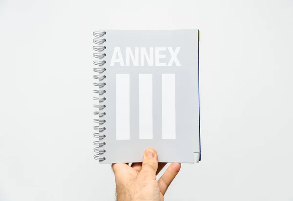 Cuaderno de mano masculino con gran número Anexo 3 tercero — Foto de Stock
