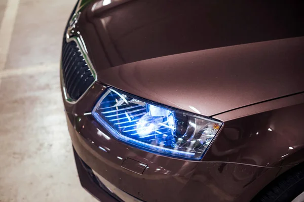 Light up blue bi-xenon led frontlight on new luxury limousine — Stock Photo, Image