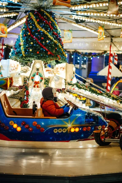 Magic futuristic car at the merry-go-round carousel in central Place Broglie — Stock Photo, Image