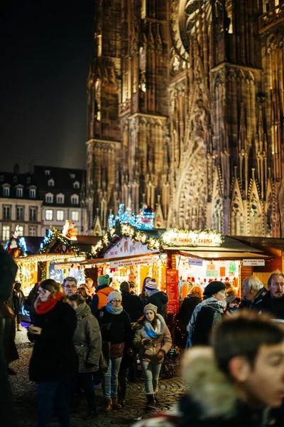 People admiring the annual Christmas Market Marche de Noel — Stock Photo, Image