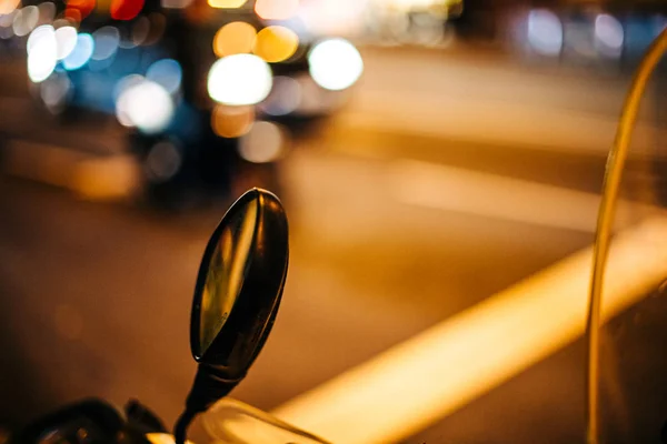 Defocused blur view of motorcycle moped rear view mirror with defocused blurred view — ストック写真