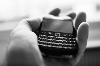 Blackberry Palm vintage akıllı telefonlarda kullanılan el kameralı mercek. Kapalı Blackberry klavyesiyle üretilmiş.