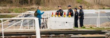 coronavirus crisis Group of German Polizei Police officers checkpoint people at the border clipart