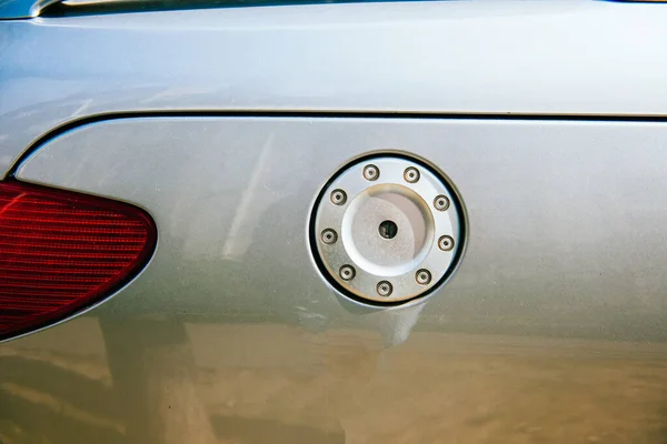 Close-up detail of new silver sport car with gas-tank — Stock Photo, Image