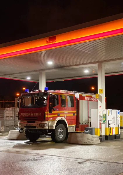 Feuerwehr Firefighter Iveco Magirus truck loading gas at SHELL gas station — Stock Photo, Image