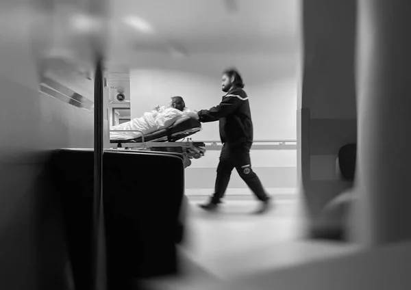 Defocused blur conceptual image of patient on the ward bed being transported with urgency — Stock Photo, Image