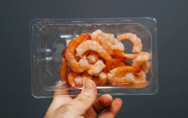 Man Hand Pov Fresh Decorticated Shrimps Plastic Package Isolated Gray — Stock Photo, Image