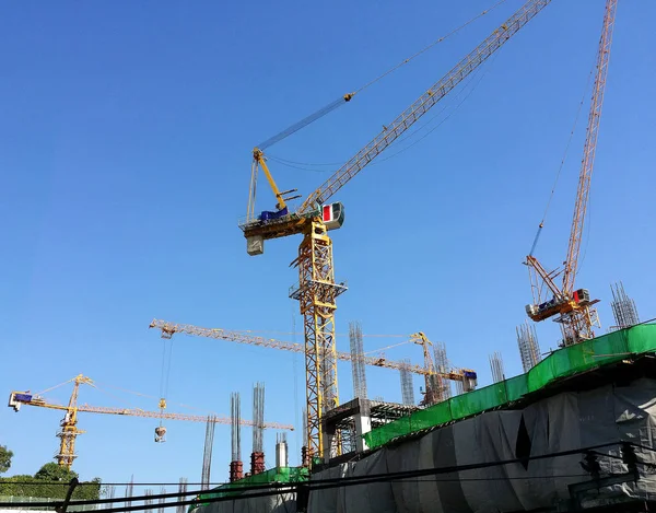 Construction site and yellow crane. — Stock Photo, Image