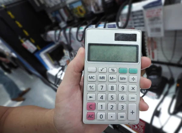 Calculator and man hand. — Stock Photo, Image