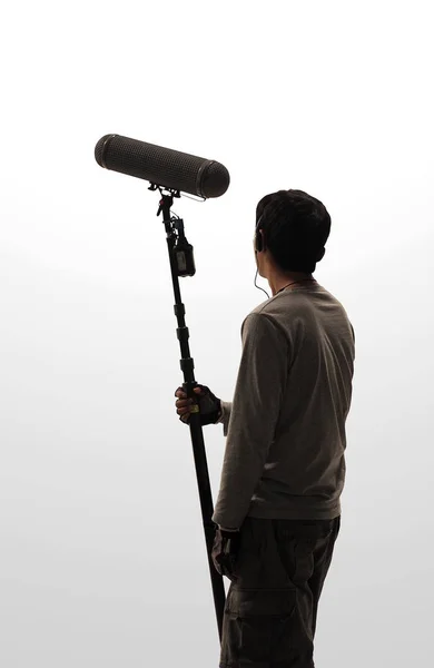 Boom Microphone hold up high by crew. — Stock Photo, Image