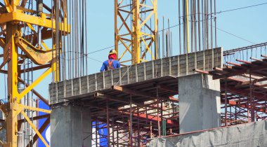 Labor or worker on building construction site. clipart