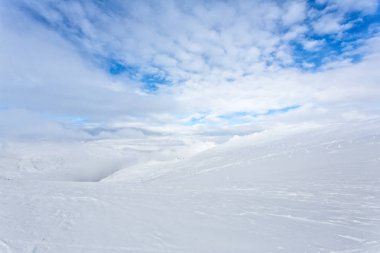 snow-capped peaks of mountains clipart