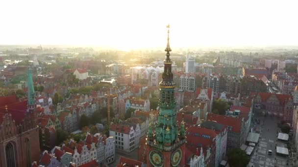 Gdansk, Poland. Aerial 4K reveal video of old city, Motlawa river and famous monuments: Gothic St Mary church, city hall tower, — Stock Video