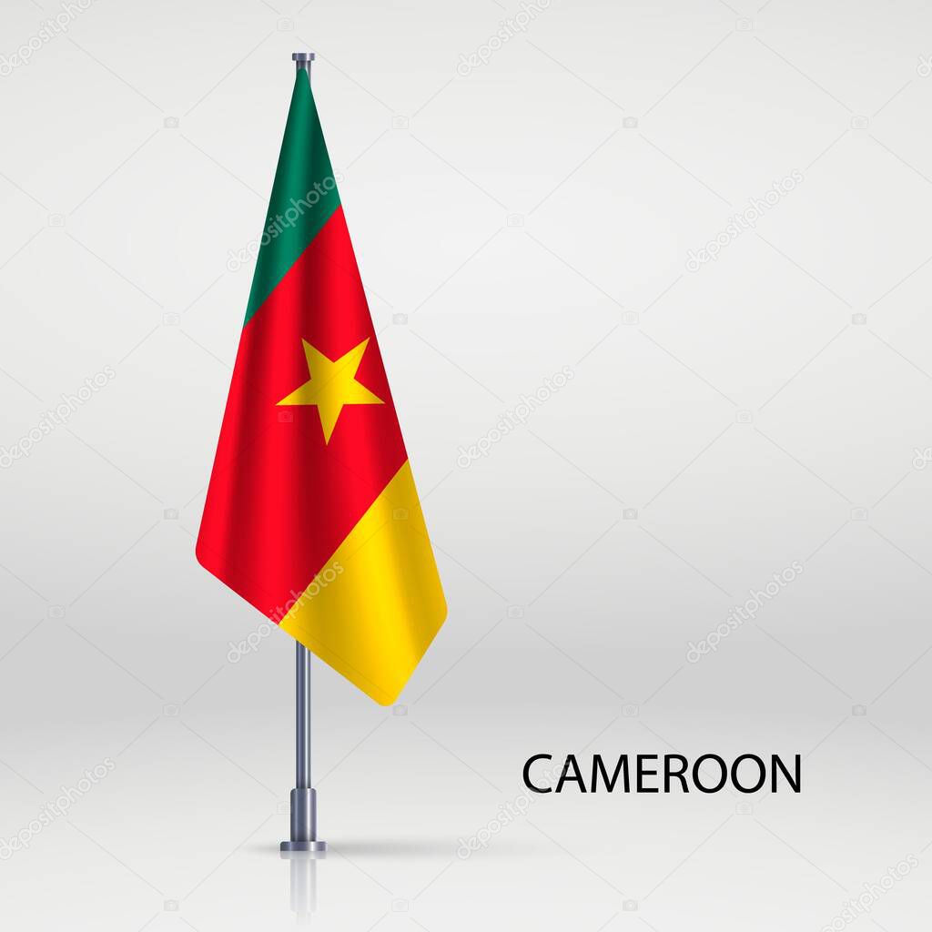 Cameroon hanging flag on flagpole