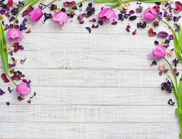 Floral frame with purple tulips