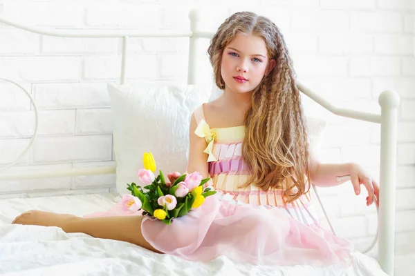 Beautiful little girl in pink dress — Stock Photo, Image