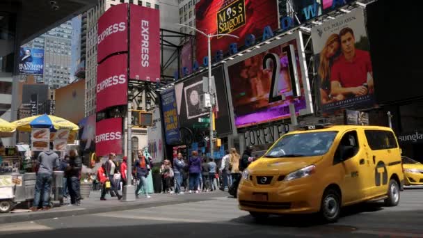 NEW YORK CITY, USA - June 09, 2017: Tourists walk in The Famous Times Square in Manhattan, Car Traffic,LED Signs, Crowded New York City, Yellow Cab Taxi, UltraHd 4k — Stock Video