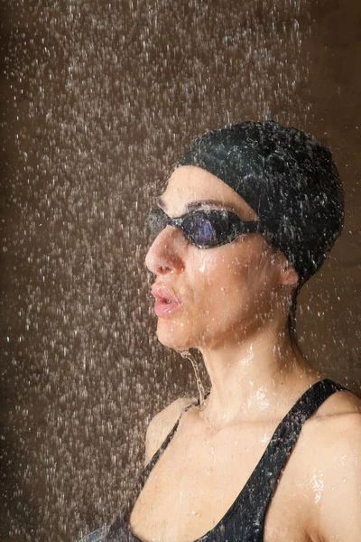 Swimmer woman face under the stream of water — Stock Photo, Image