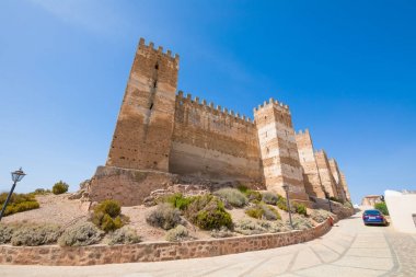 corner of Burgalimar Castle in Banos de la Encina clipart