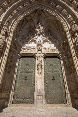 detail of side door Cathedral in Toledo vertical clipart