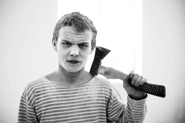 Dirty hard worker with axe — Stock Photo, Image