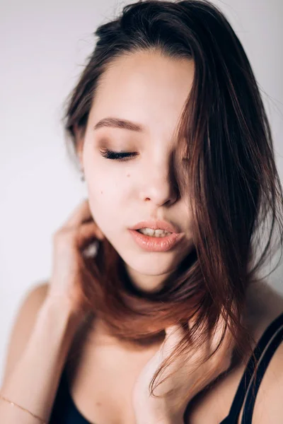 Close up portrait of a beautiful woman. Sexy girl looking down. — Stock Photo, Image