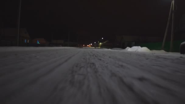 Winter road. Snow and ice complicates the movement and shooting — Stock Video