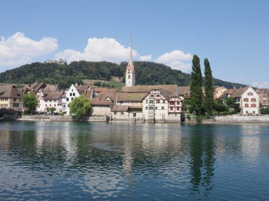 Marvelous St. George's Abbey at Rhine River at cityscape european STEIN am RHEIN town in SWITZERLAND, canton Schaffhausen on alpine landscapes, clear blue sky in 2018